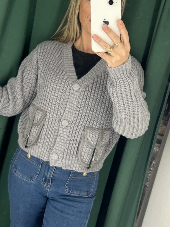 rebeca gris bolsillos