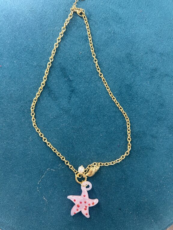 colgante estrella mar rosa