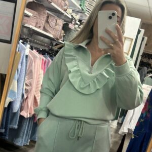 sudadera volante verde agua