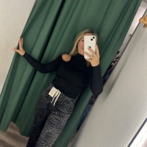 jersey negro hombro fuera